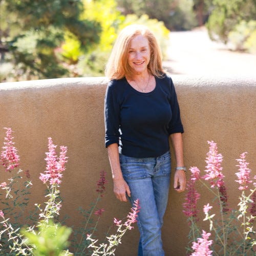 Ava Salman stands with her namesake Agastache 'Ava' in her New Mexico garden.